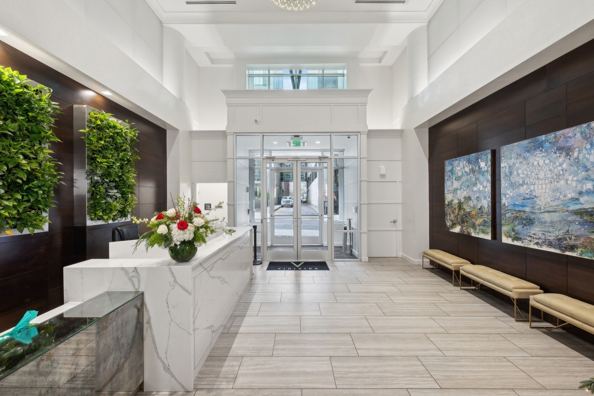 415 Church Street, Unit 2007 Nashville, TN 37219 - Photo 1 of 18 a living room with furniture and a large window