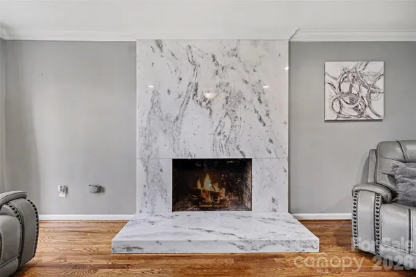 a living room with a fireplace