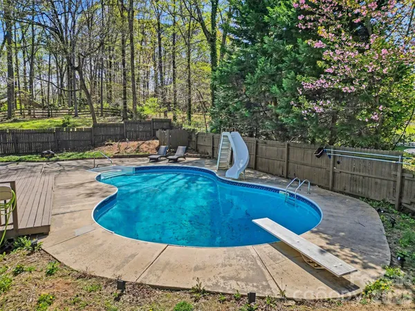 a view of a swimming pool with a sitting space