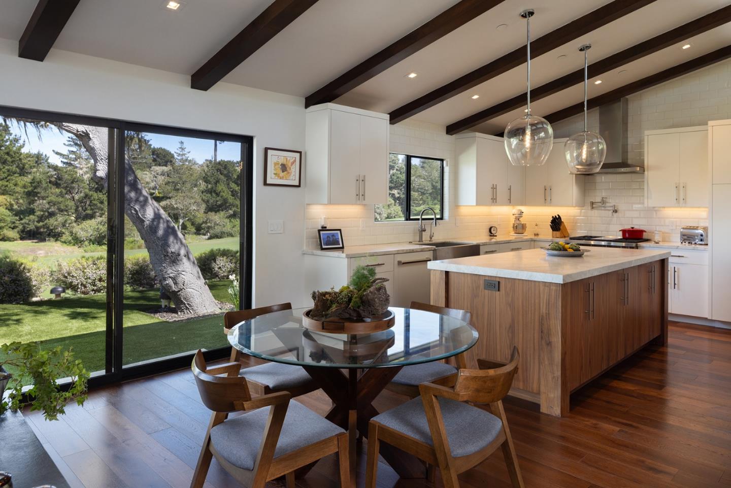 2931 Sloat Road Pebble Beach, CA 93953 - Photo 5 of 34 a dining room with furniture and a floor to ceiling window
