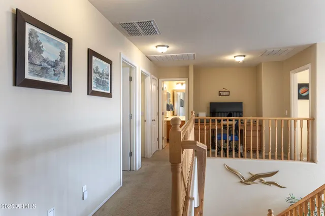 a view of hallway with furniture