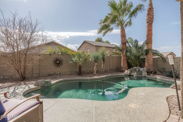a view of a backyard of the house