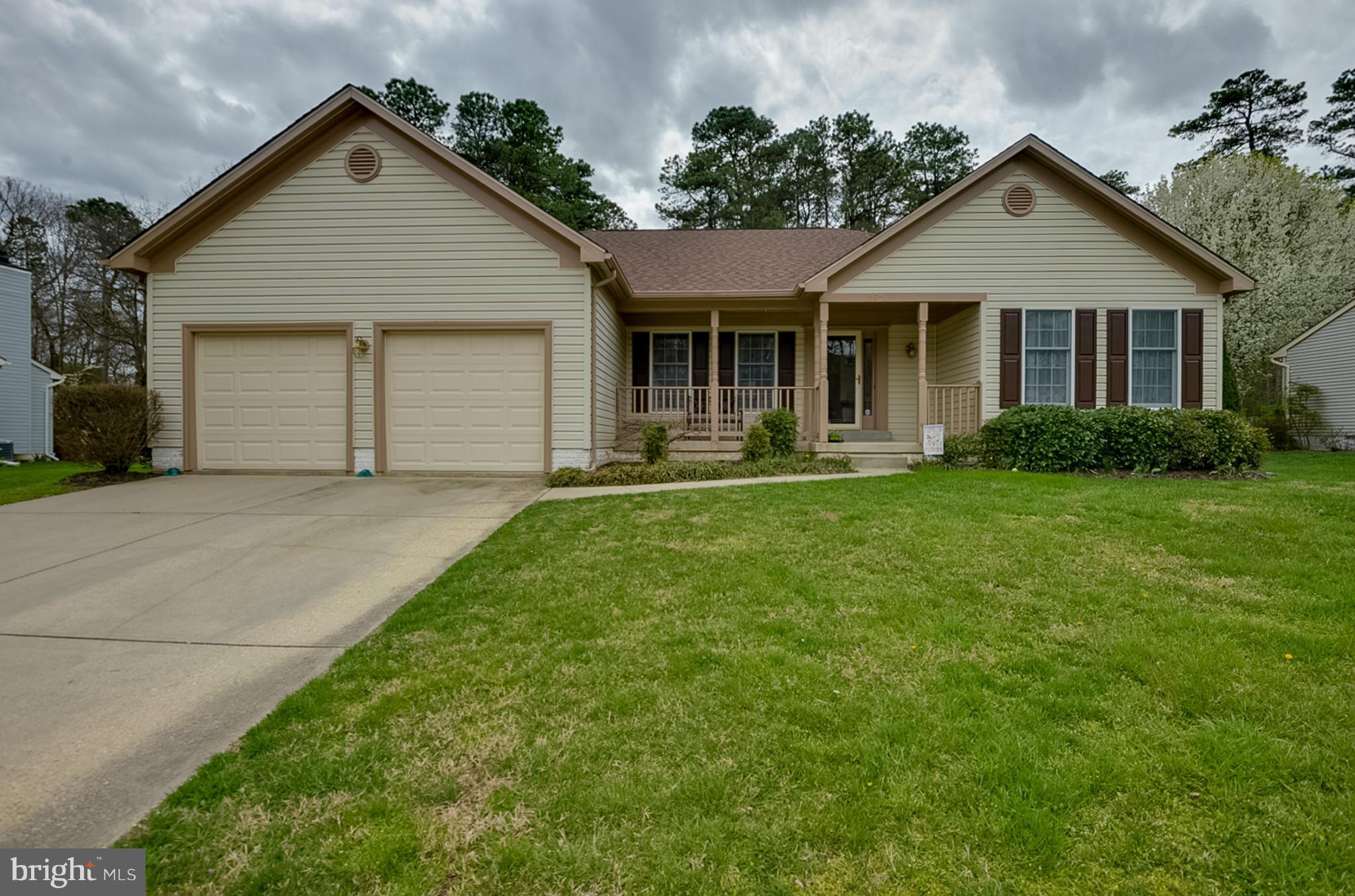 575 Pasture Brook Road Severn, MD 21144 - Photo 1 of 29 a front view of a house with a yard and garage