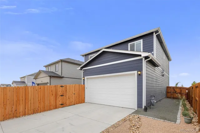 a view of a house with a garage
