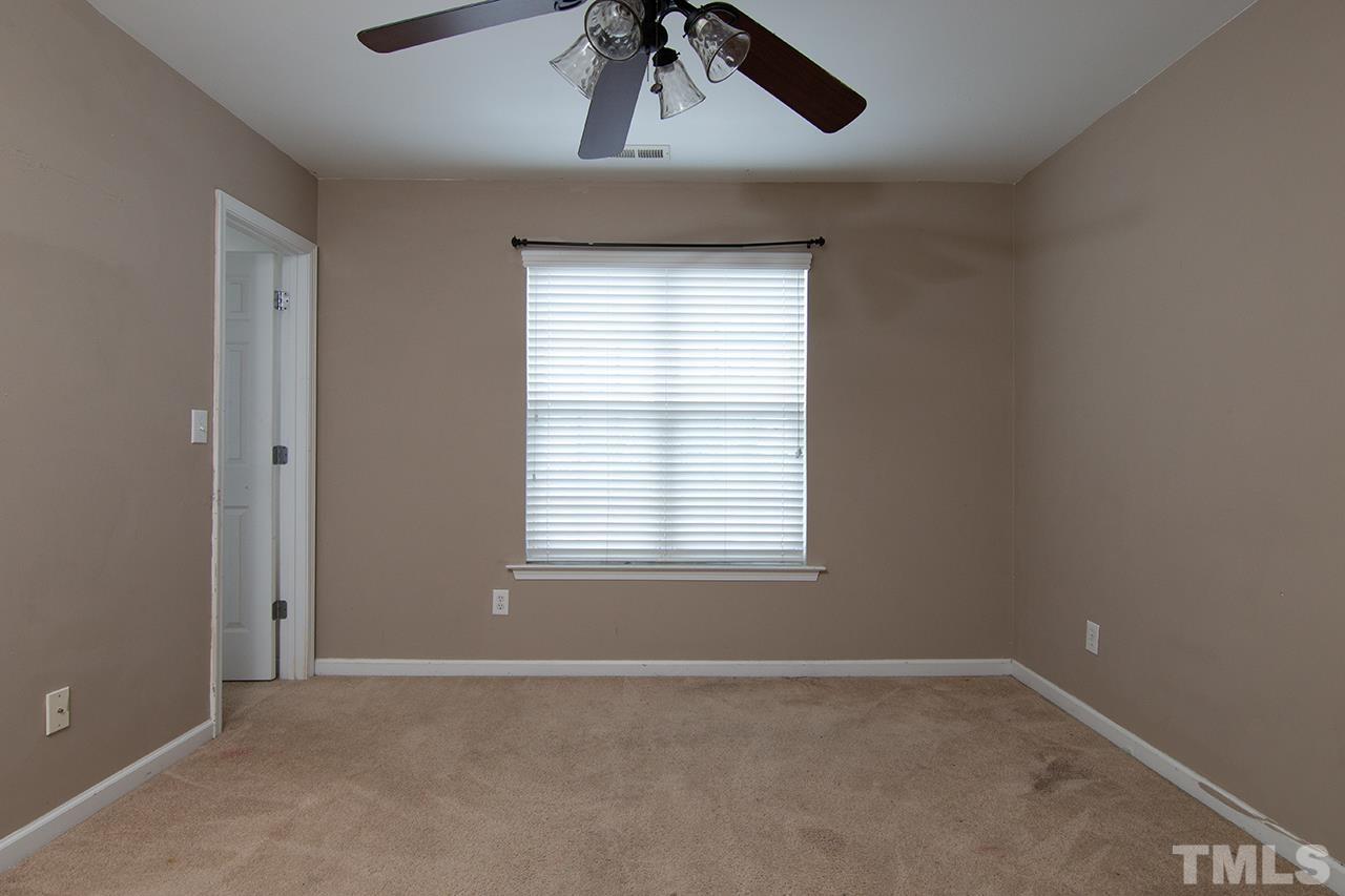 2158 Metacomet Way Raleigh, NC 27604 - Photo 8 of 12 a view of an empty room with a window