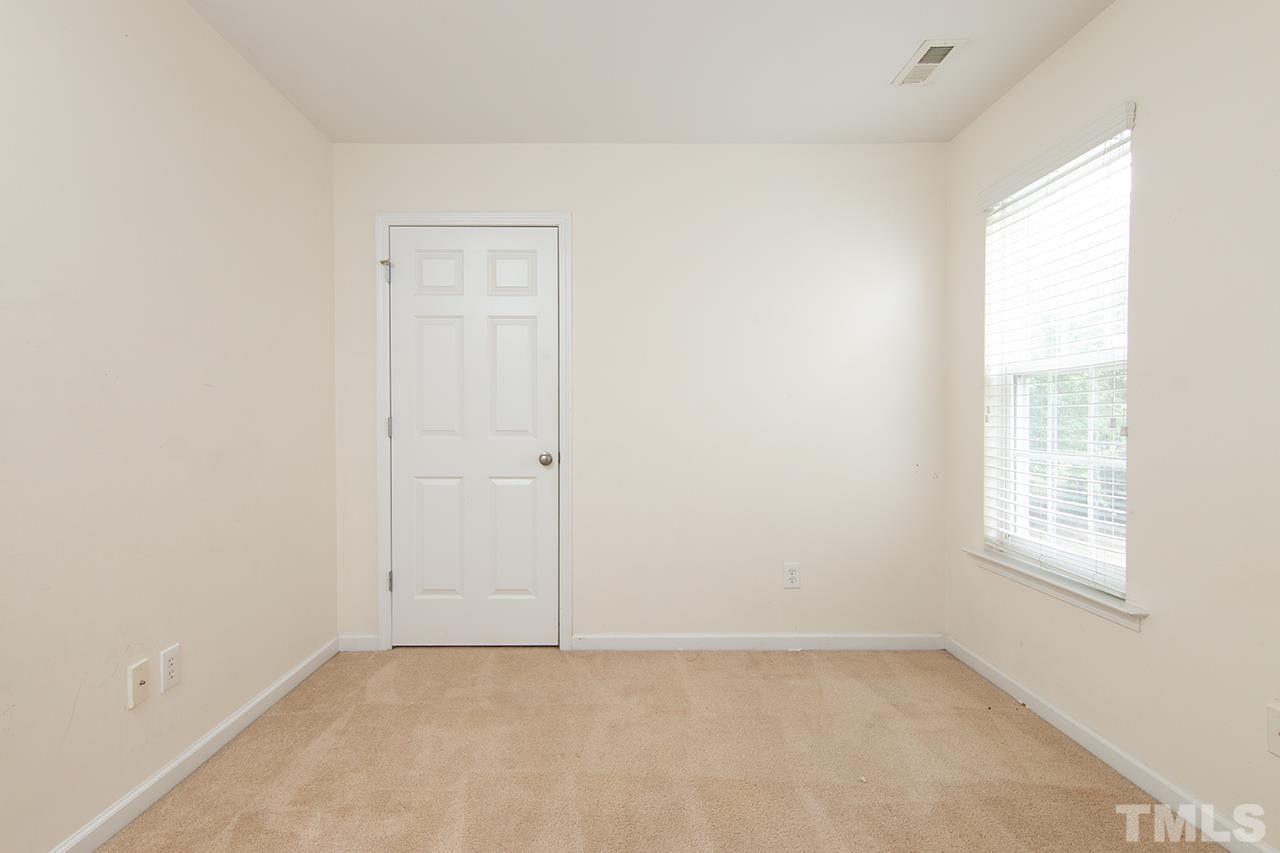 2158 Metacomet Way Raleigh, NC 27604 - Photo 10 of 12 an empty room with windows and closet
