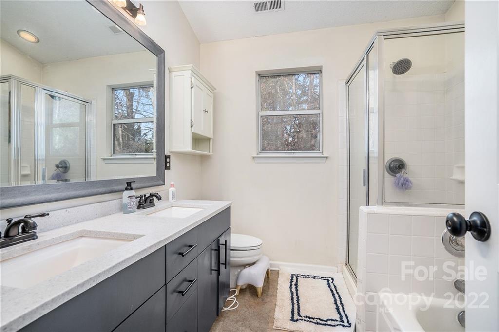 3011 Williams Station Road Matthews, NC 28105 - Photo 16 of 26 a bathroom with a sink a toilet and shower