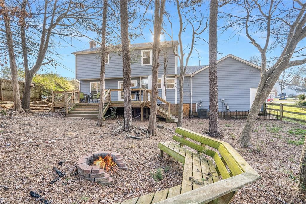 3011 Williams Station Road Matthews, NC 28105 - Photo 25 of 26 a view of a house with backyard from a chair