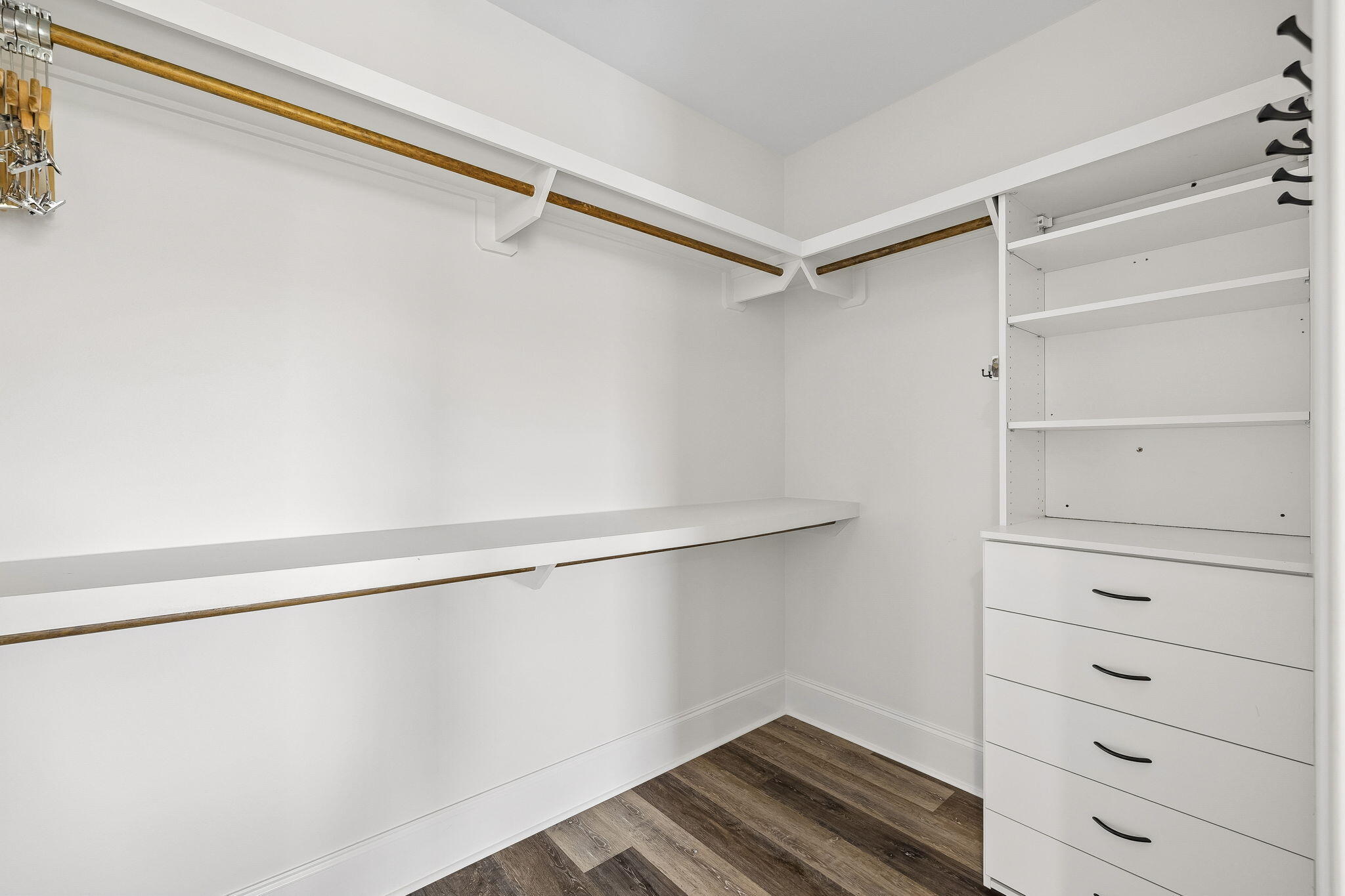 1973 Baytowne Loop Miramar Beach, FL 32550 - Photo 24 of 38 a view of walk in closet with empty racks