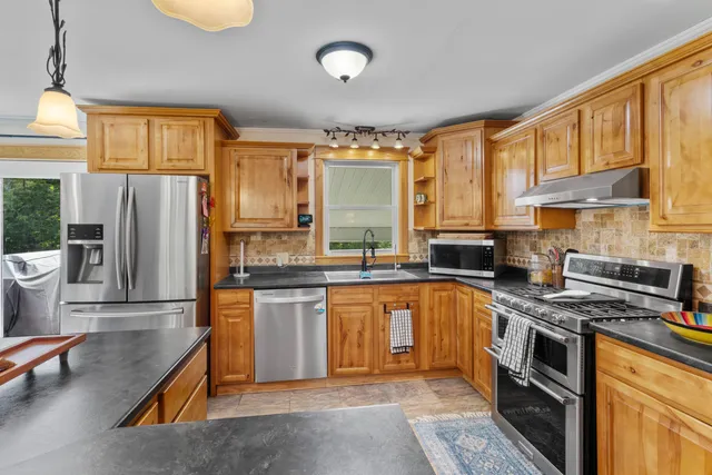 $450,000 | 32 Charles Drive, Holden, ME 04429