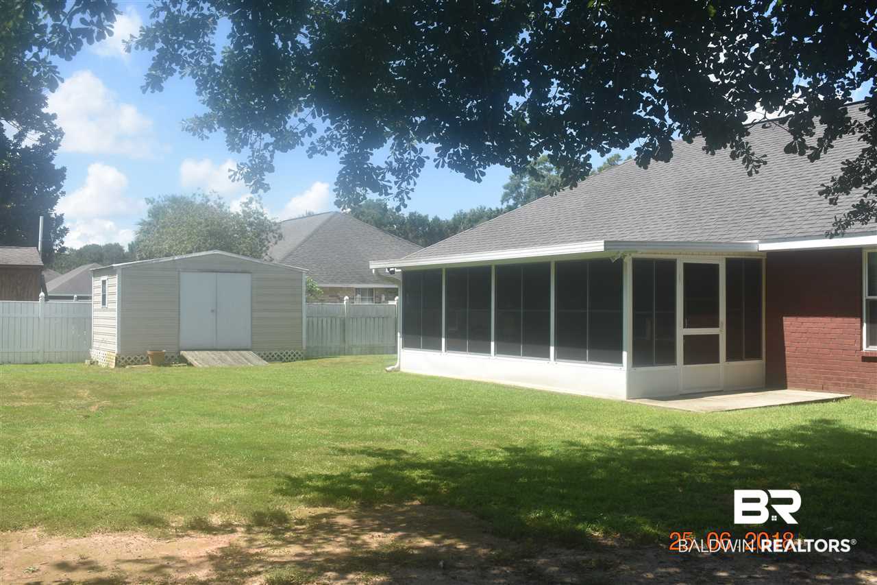 314 Monteith Oaks Drive Foley, AL 36535 - Photo 27 of 31 backyard with shed