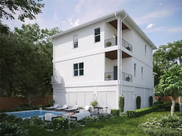 a view of building with tree in front of it