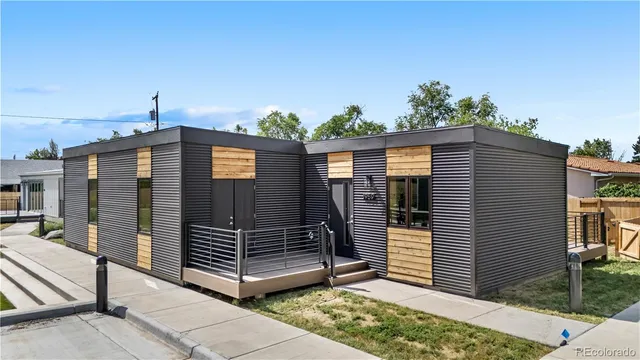 a front view of a house with garage