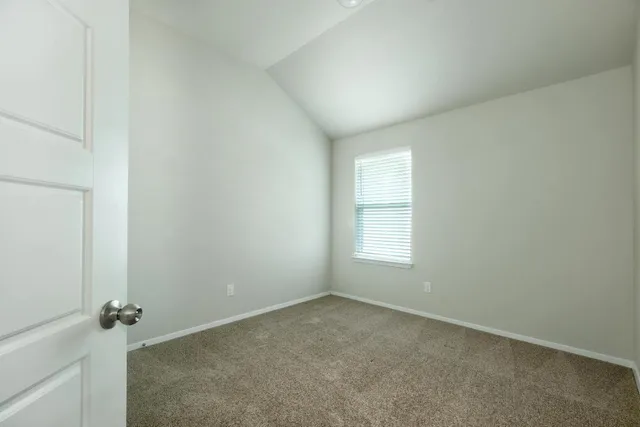 a house with trees in front of it