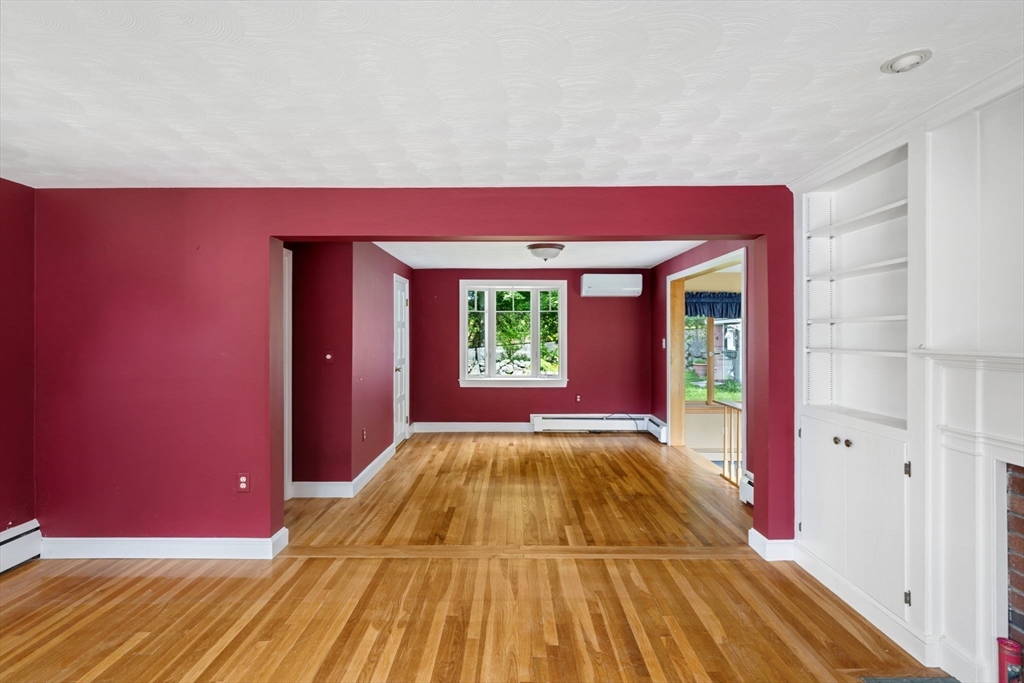 40 Bell Road Weymouth, MA 02188 - Photo 10 of 41 a view of a bedroom with a bed and a window