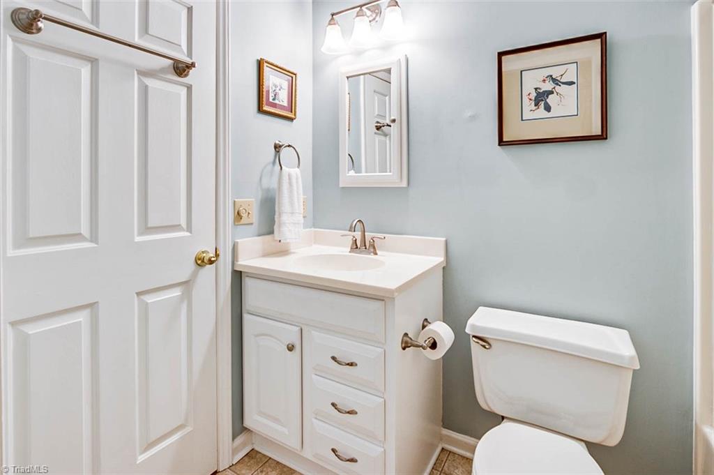 245 Hampton Road, Unit 4C Asheboro, NC 27203 - Photo 12 of 18 Owner's bath, updated vanity & lighting