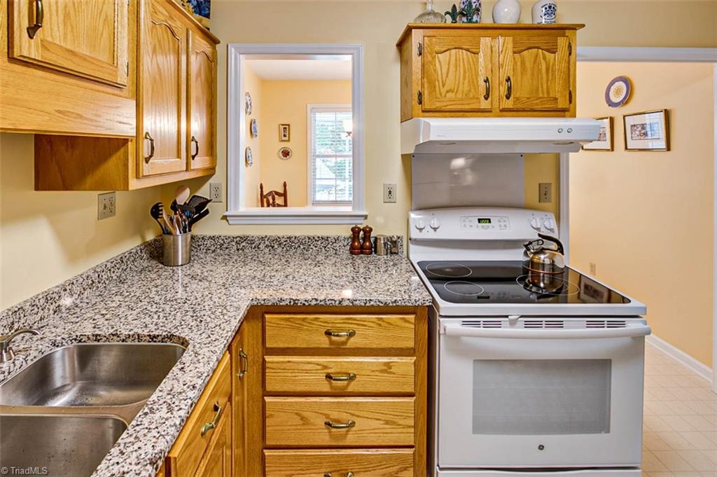 245 Hampton Road, Unit 4C Asheboro, NC 27203 - Photo 8 of 18 Kitchen, pass through window