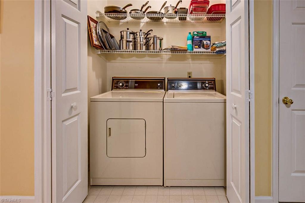 245 Hampton Road, Unit 4C Asheboro, NC 27203 - Photo 10 of 18 Laundry closet, with shelving, washer & dryer remain