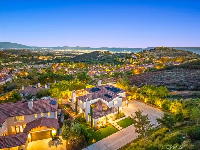 a view of a house with a swimming pool