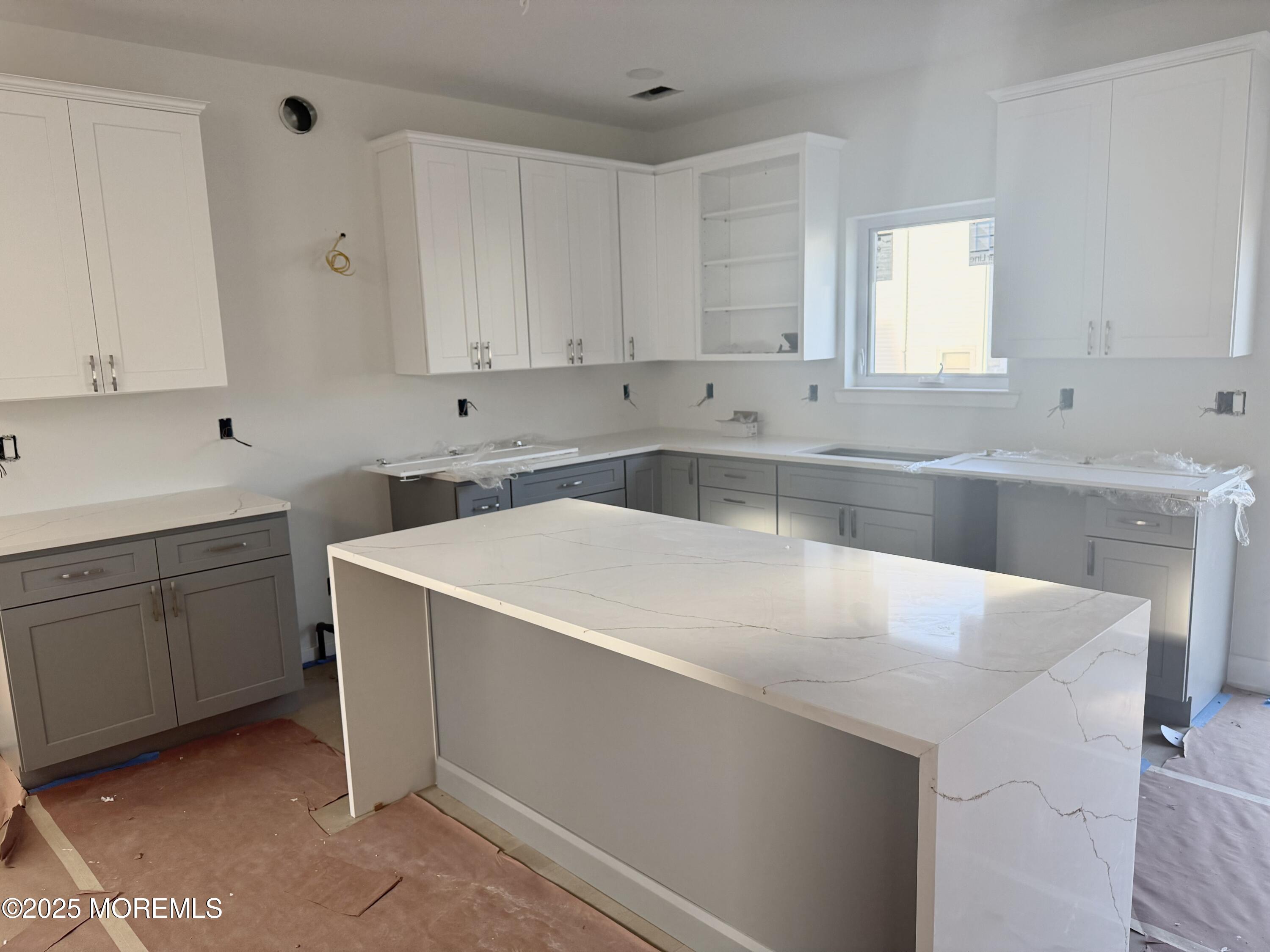 2 B Dey Street Manalapan, NJ 07726 - Photo 8 of 24 a kitchen with a sink cabinets and window