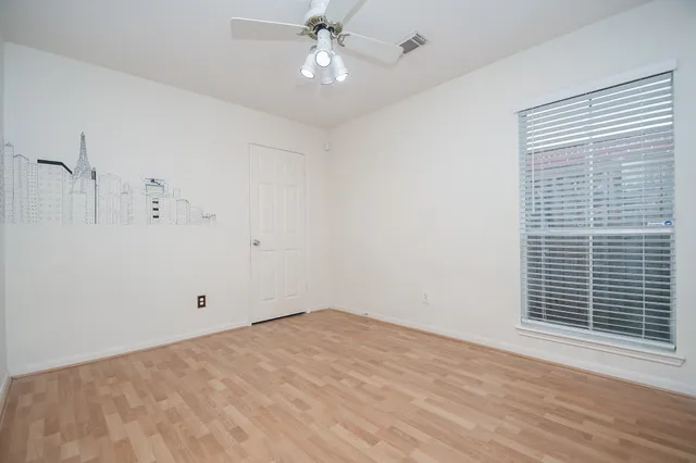 a view of a room with an empty space