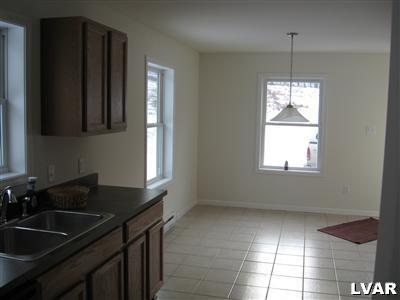 315 Evergreen Road Lehighton, PA 18235 - Photo 4 of 23 Sunny, open breakfast area. Ceramic tile flooring