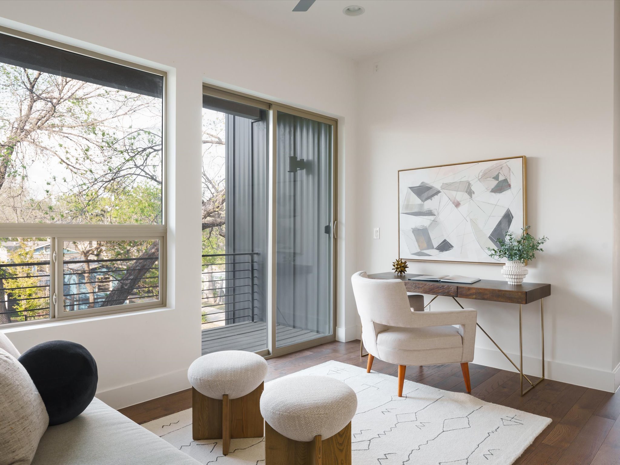 615 Jewell Street Austin, TX 78704 - Photo 9 of 25 Upstairs you will find a serene bonus living area with oversized windows that frame treetops views.