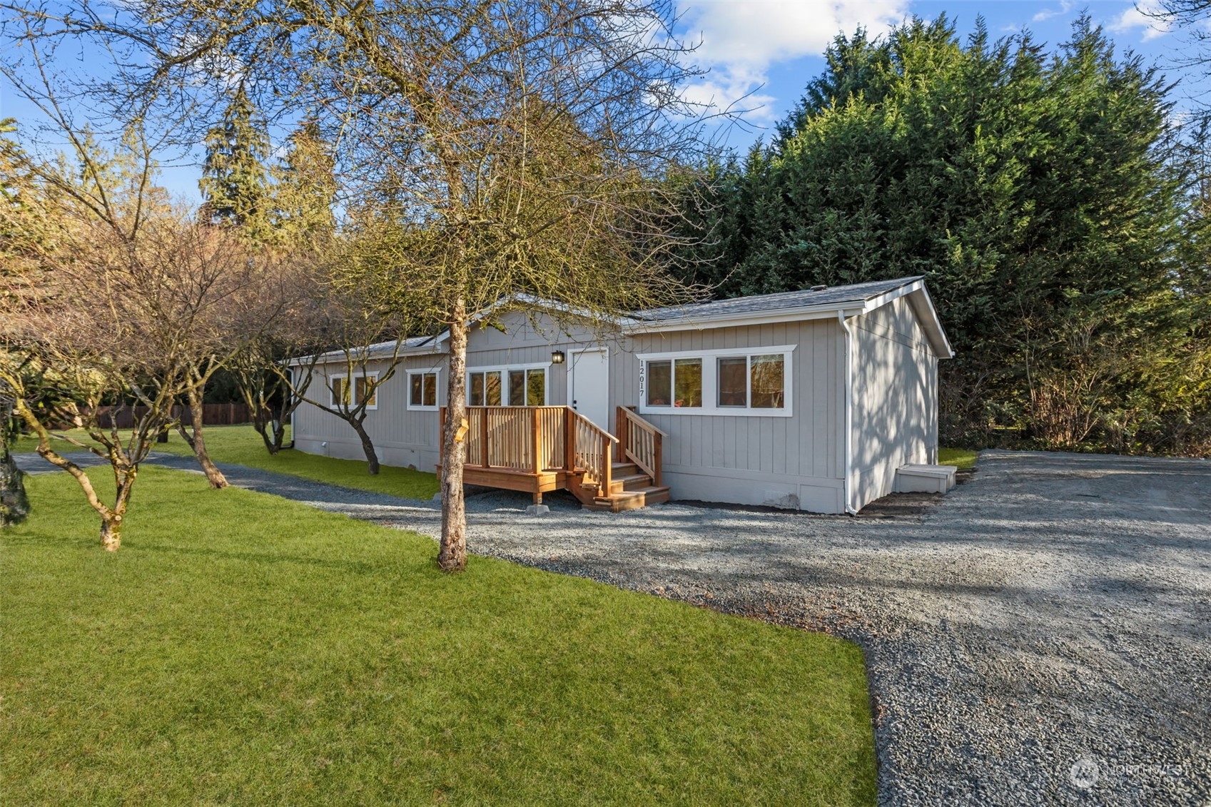 12017 Chappel Road Arlington, WA 98223 - Photo 1 of 40 a view of a house with backyard and a tree