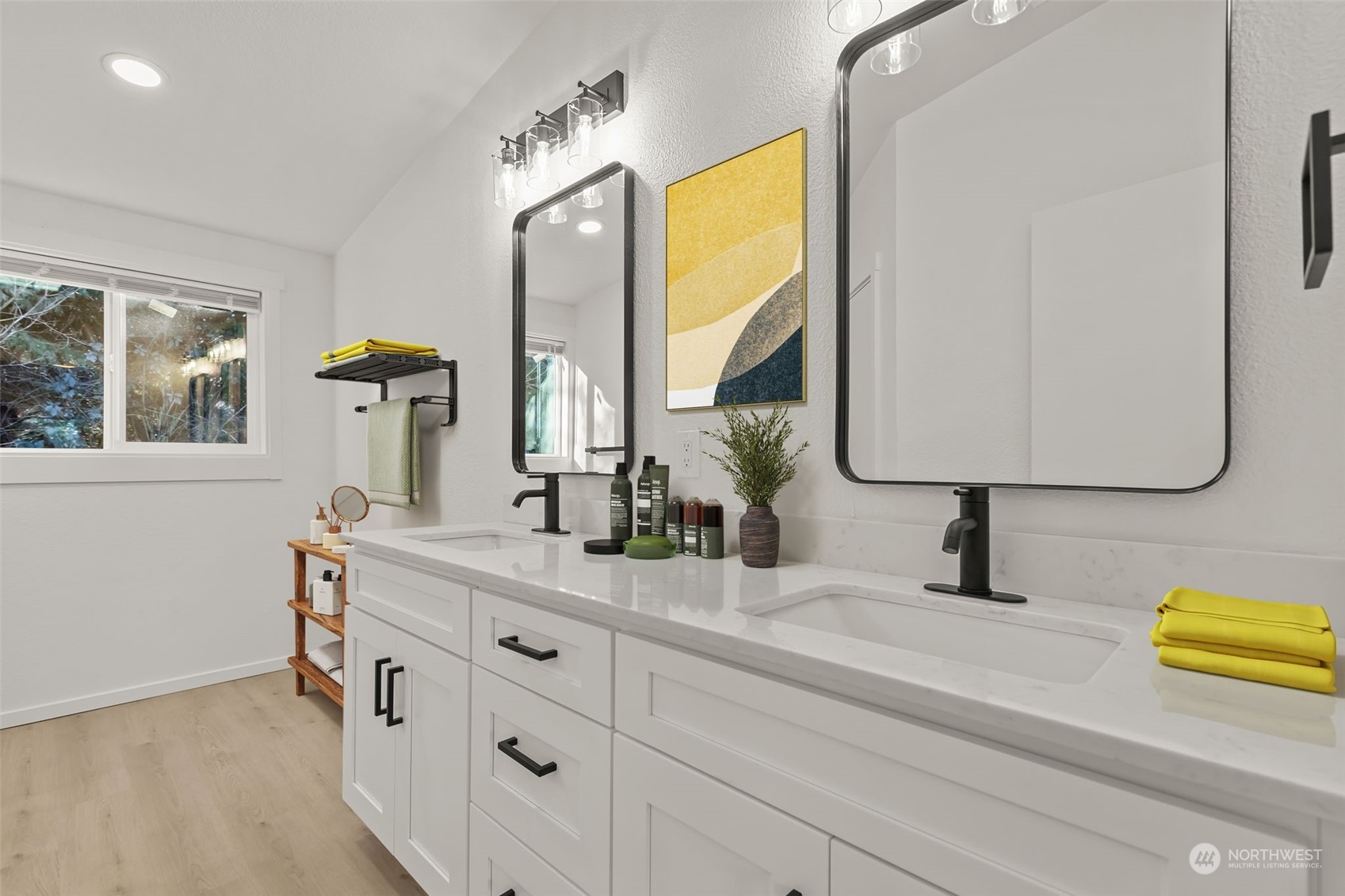 12017 Chappel Road Arlington, WA 98223 - Photo 12 of 40 a bathroom with a double vanity sink and a mirror