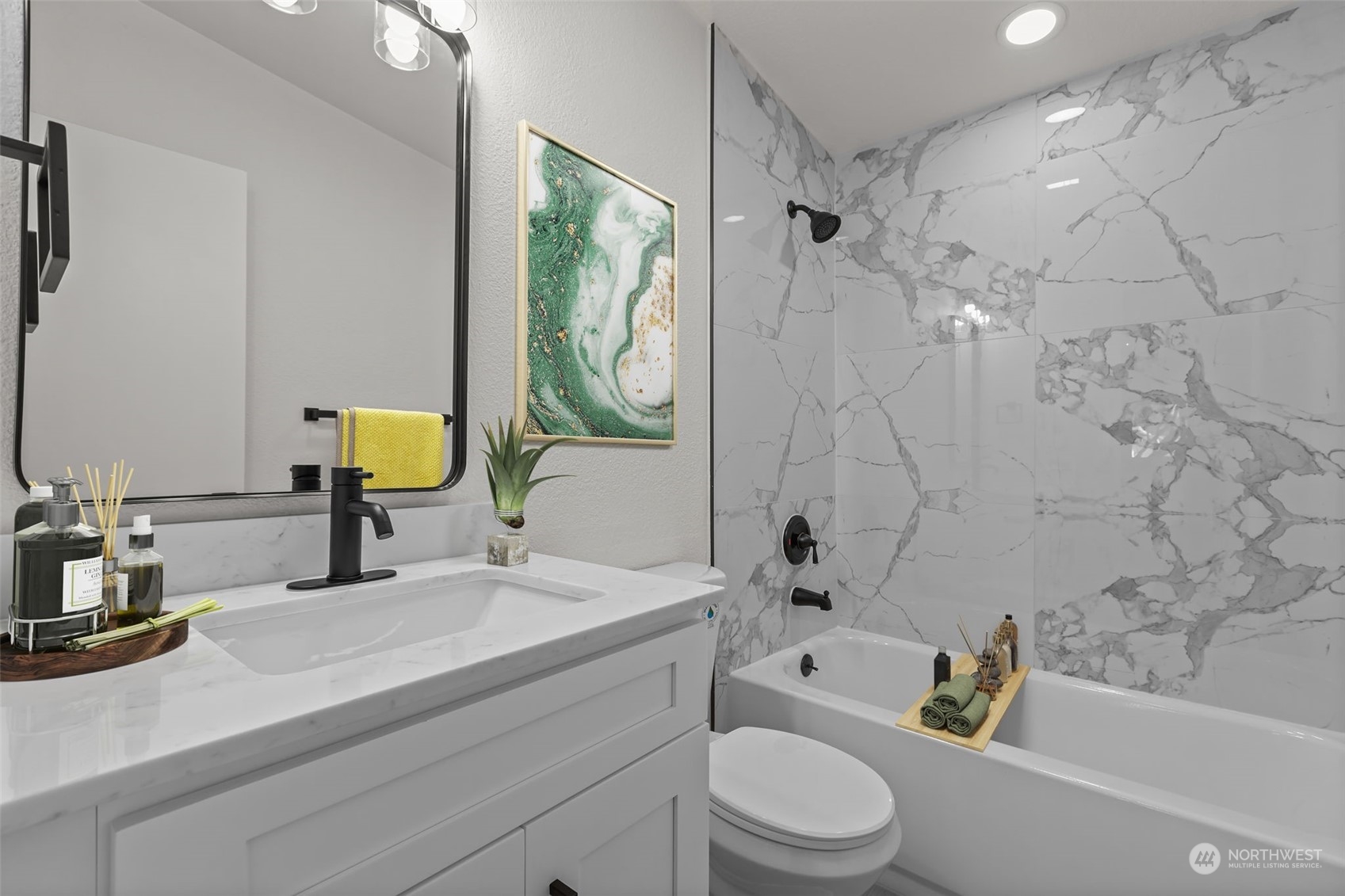 12017 Chappel Road Arlington, WA 98223 - Photo 16 of 40 a bathroom with a granite countertop bathtub sink vanity mirror and toilet