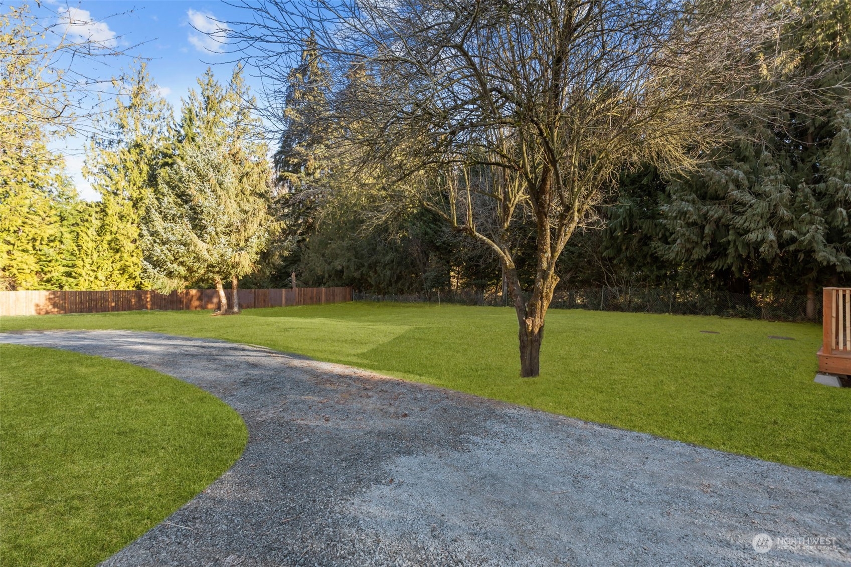12017 Chappel Road Arlington, WA 98223 - Photo 21 of 40 a view of outdoor space with deck area and trees