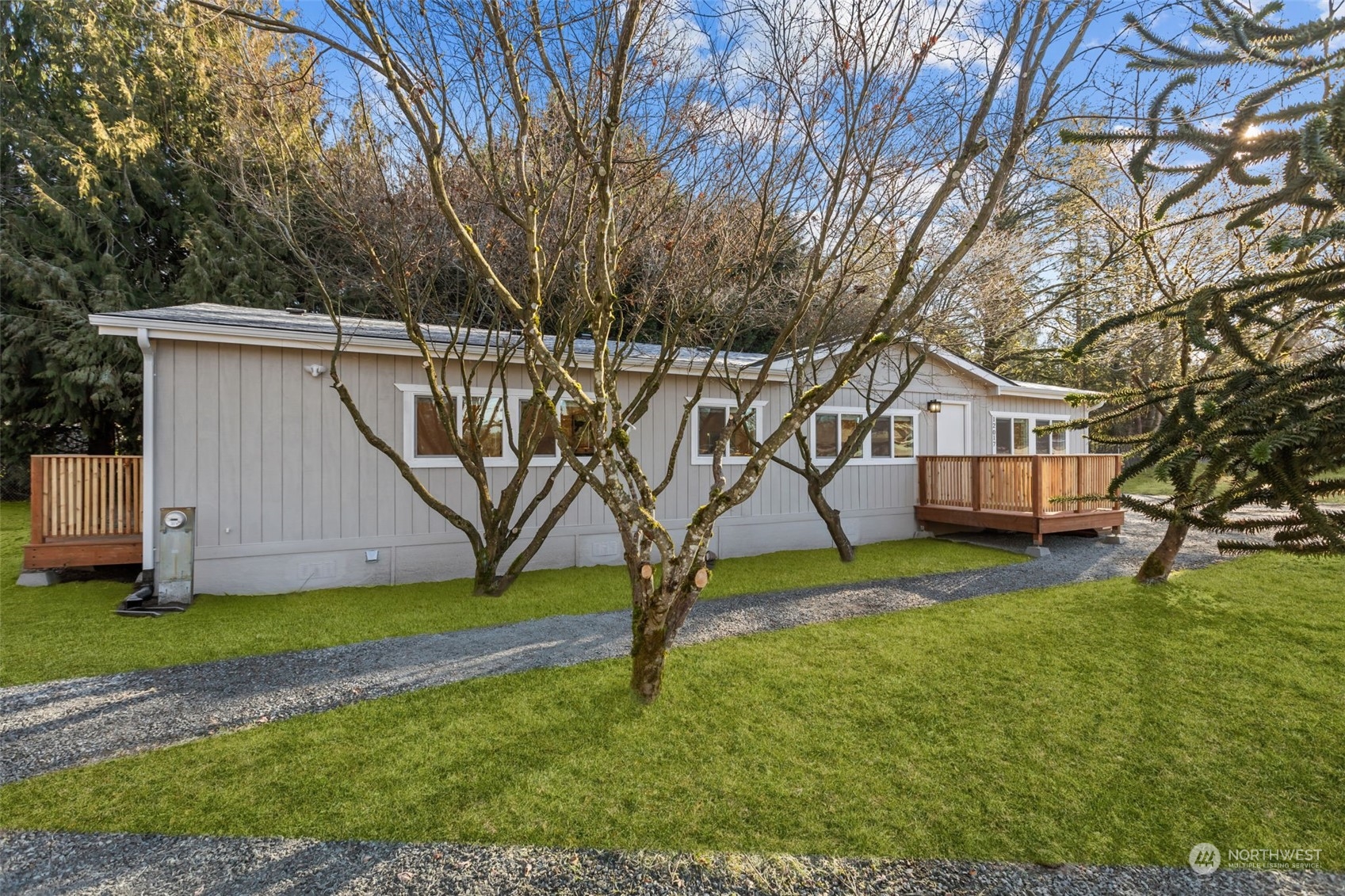 12017 Chappel Road Arlington, WA 98223 - Photo 28 of 40 a house with trees in front of it
