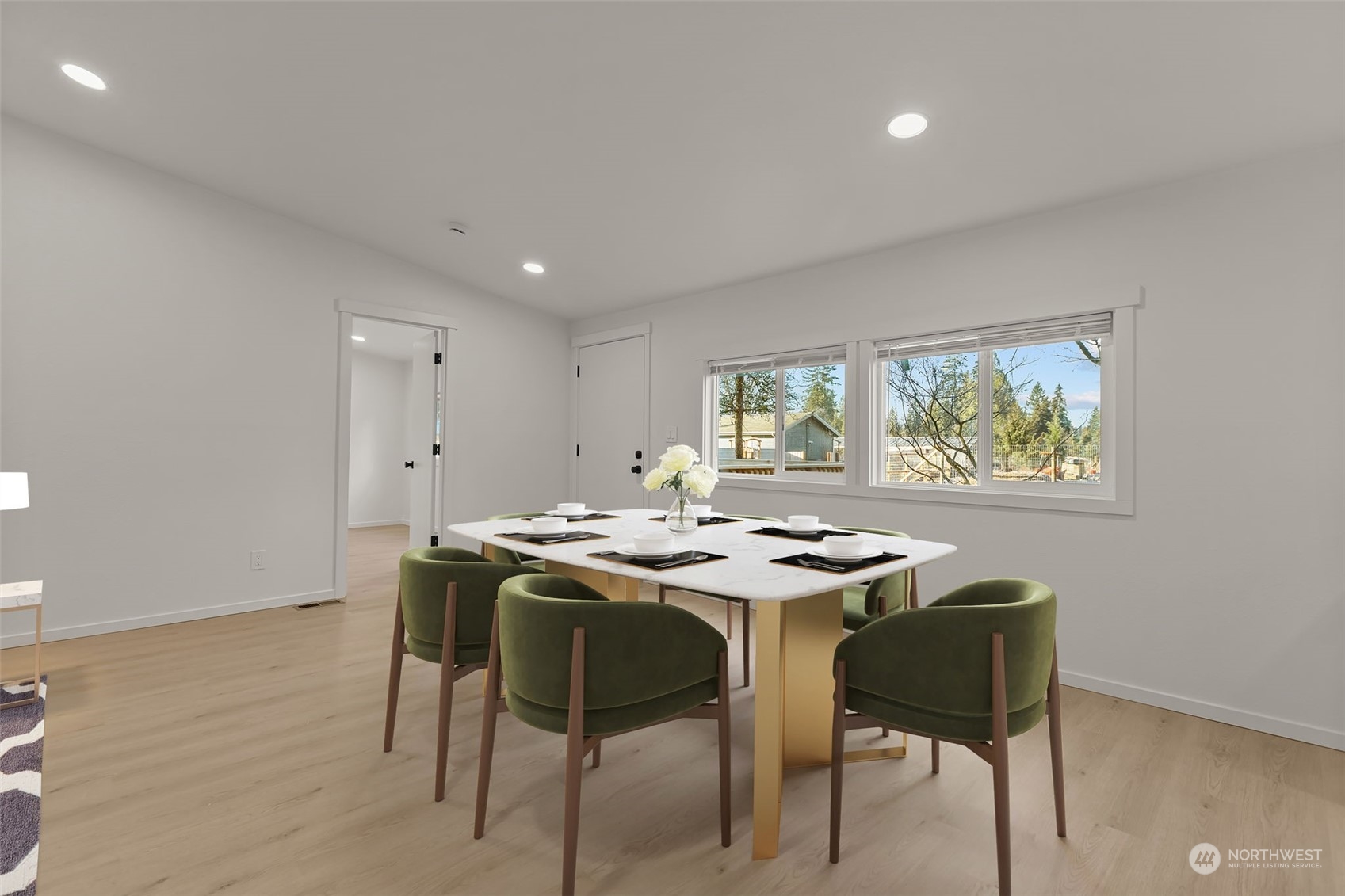 12017 Chappel Road Arlington, WA 98223 - Photo 6 of 40 a view of a dining room that has a table and chairs in it