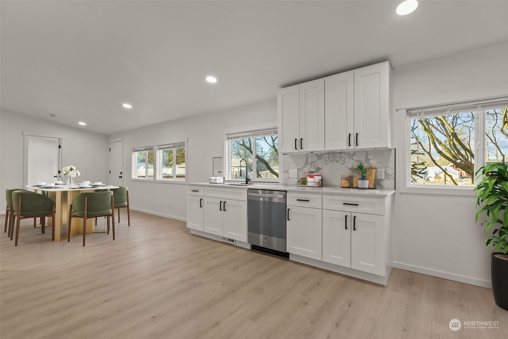 12017 Chappel Road Arlington, WA 98223 - Photo 9 of 40 a kitchen with white cabinets and sink