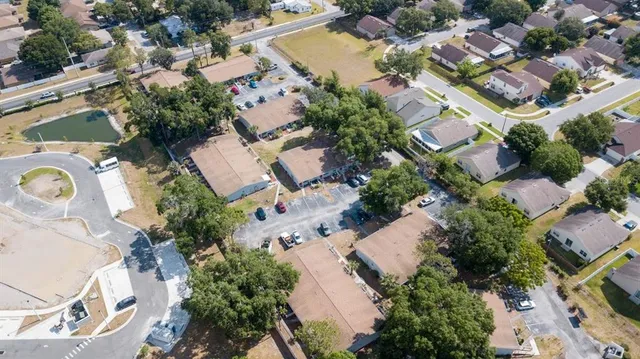 an aerial view of residential house with outdoor space