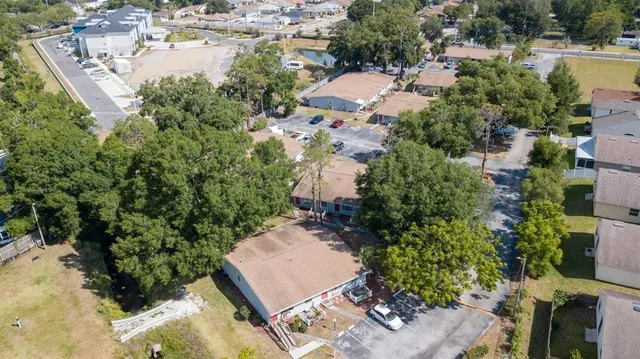 an aerial view of residential house with outdoor space