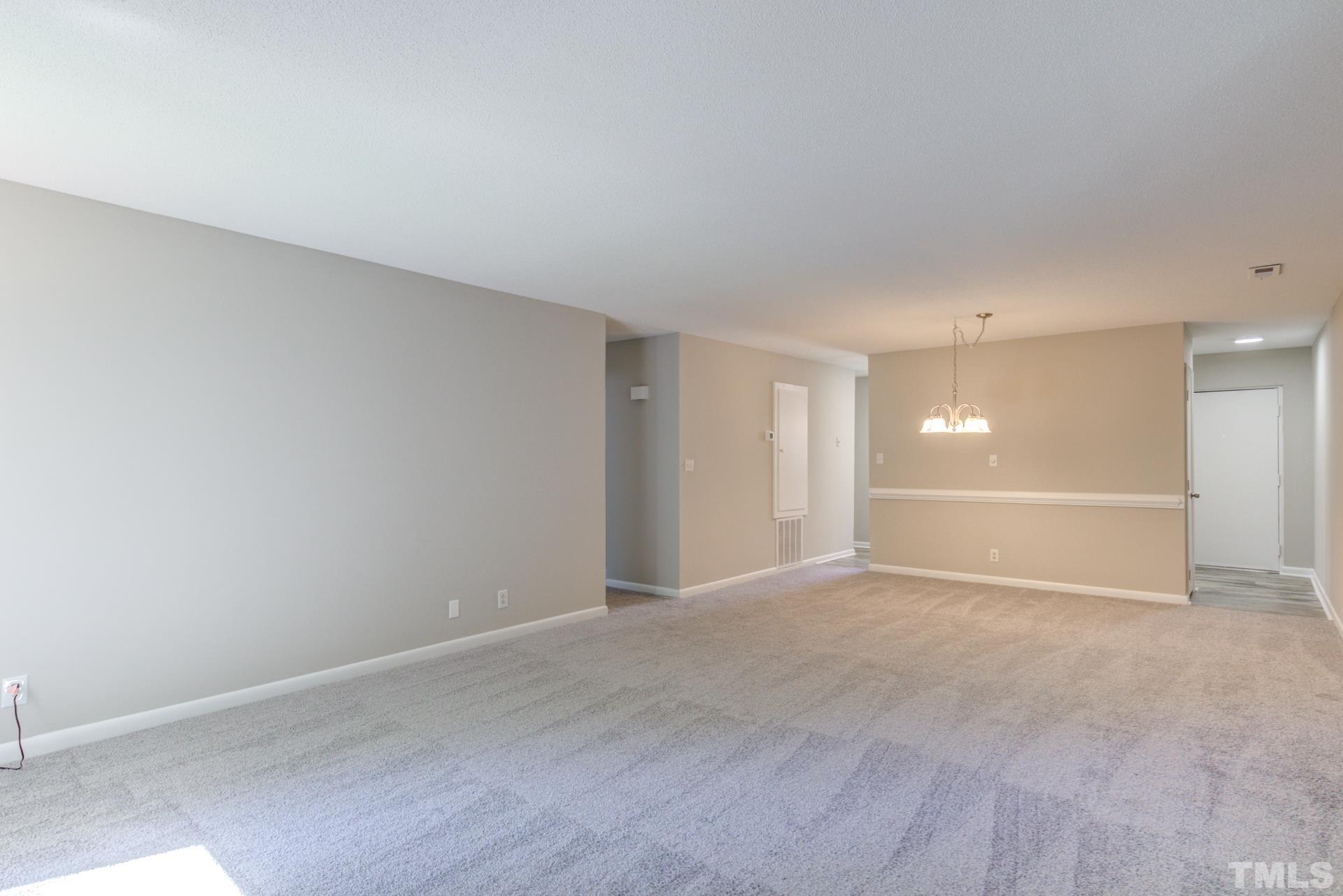 5062 Flint Ridge Place, Unit 5062 Raleigh, NC 27609 - Photo 12 of 23 a view of an empty room