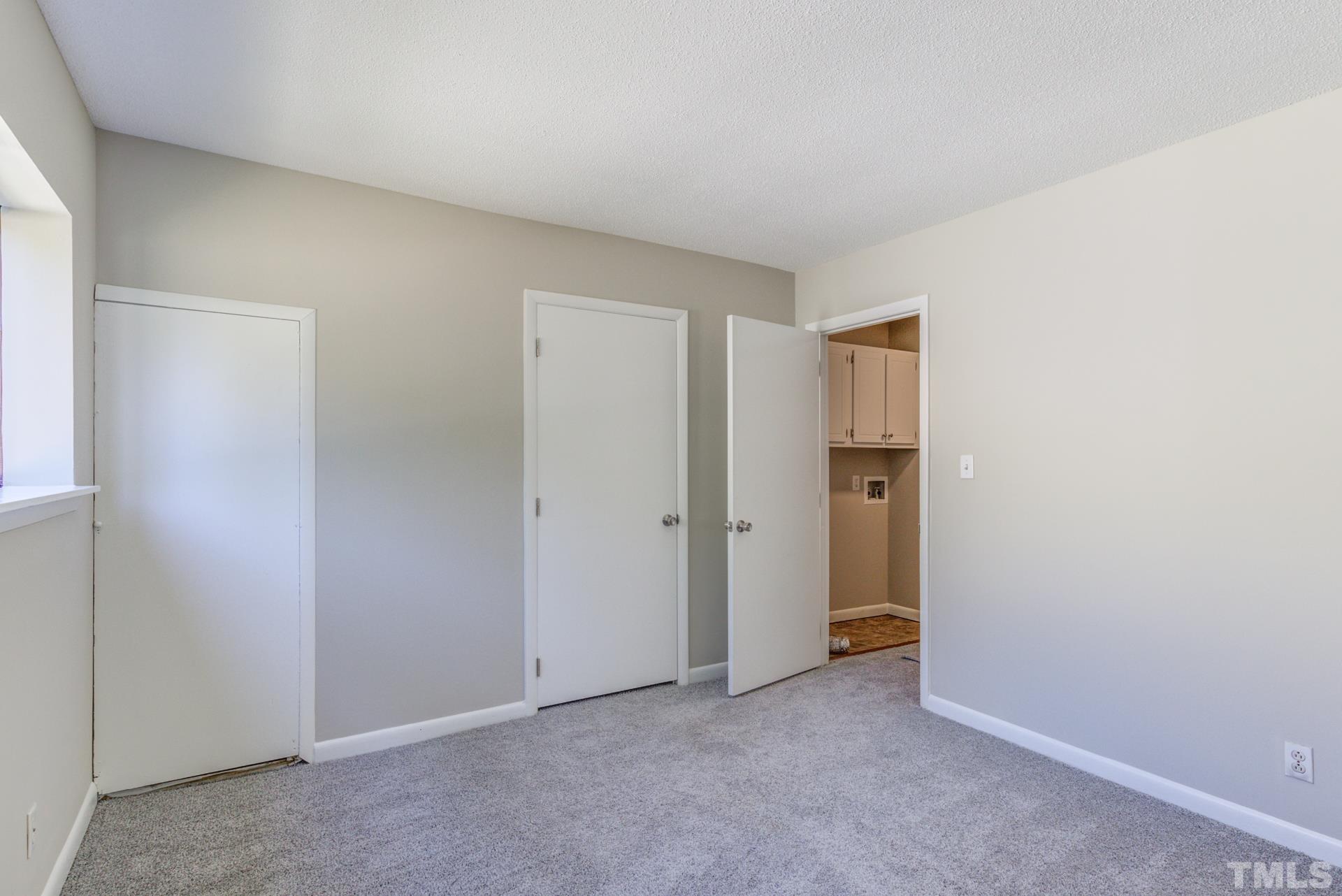 5062 Flint Ridge Place, Unit 5062 Raleigh, NC 27609 - Photo 20 of 23 a view of an empty room and closet area