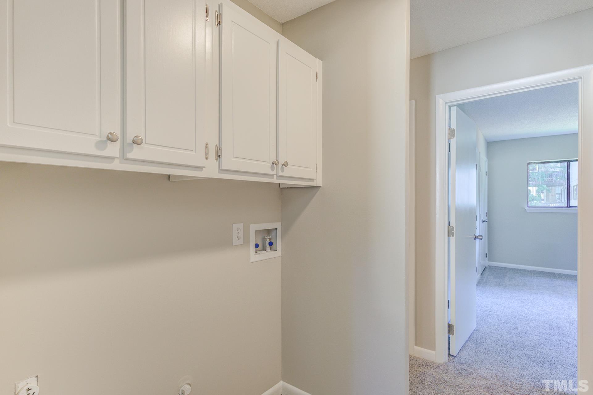 5062 Flint Ridge Place, Unit 5062 Raleigh, NC 27609 - Photo 21 of 23 a view of cabinets