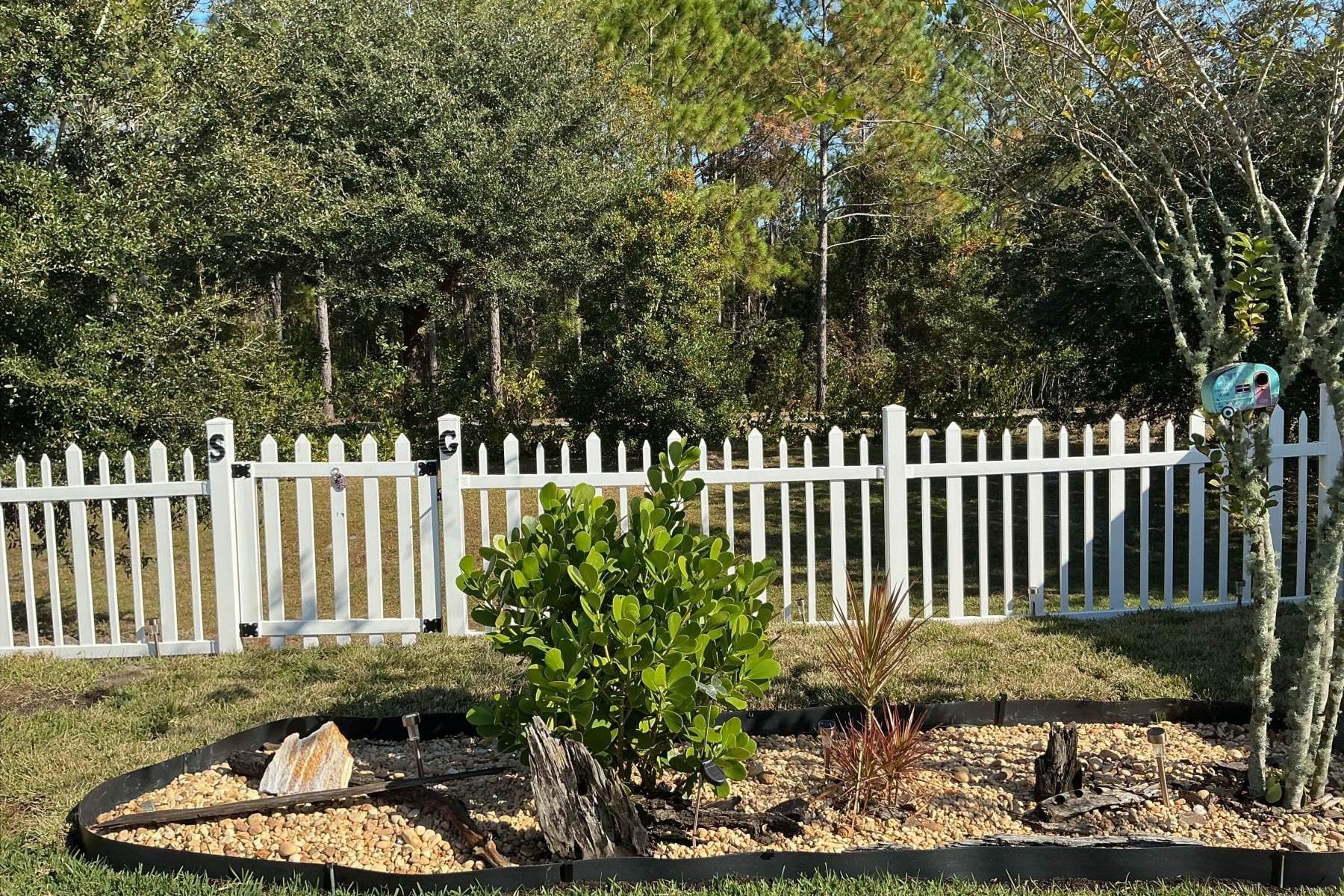 25 Rivertown Road Palm Coast, FL 32137 - Photo 14 of 40 a garden view