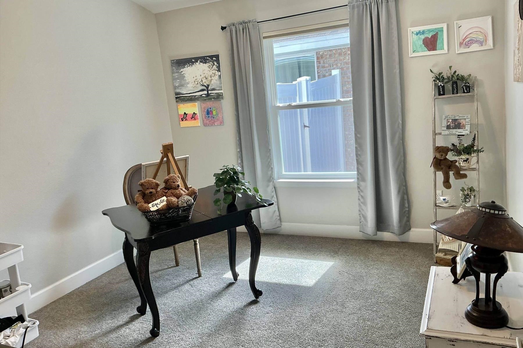 25 Rivertown Road Palm Coast, FL 32137 - Photo 23 of 40 a view of a workspace with furniture and wooden floor