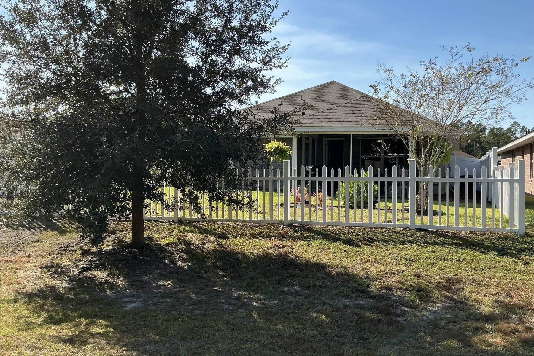 25 Rivertown Road Palm Coast, FL 32137 - Photo 27 of 40 a front view of a house with a garden