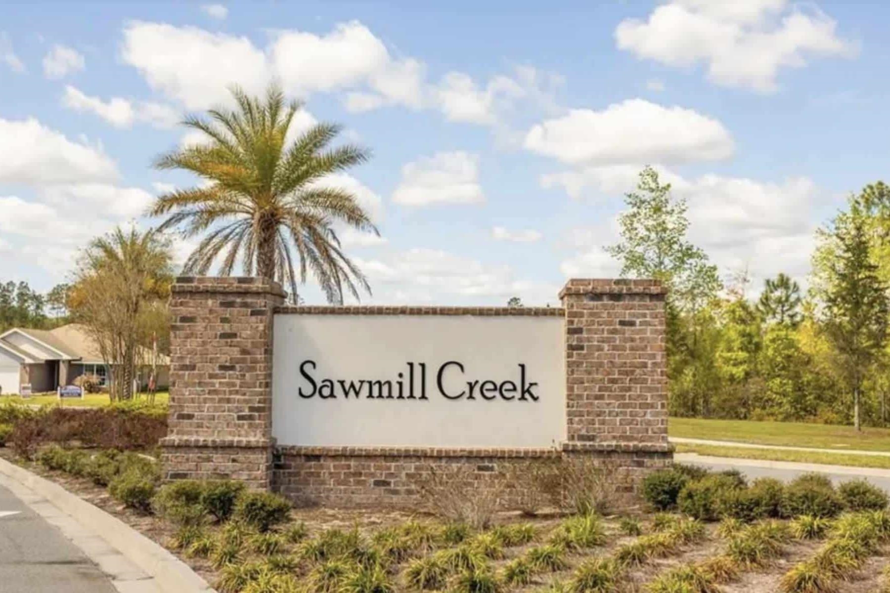 25 Rivertown Road Palm Coast, FL 32137 - Photo 31 of 40 a street sign with a building in the background