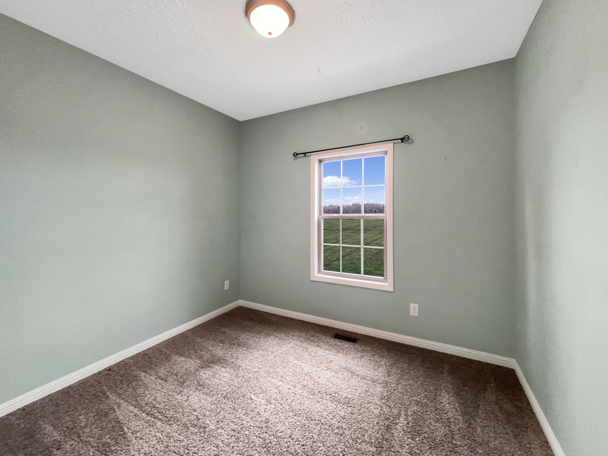 374 Cook Road Portland, TN 37148 - Photo 13 of 16 an empty room with a window