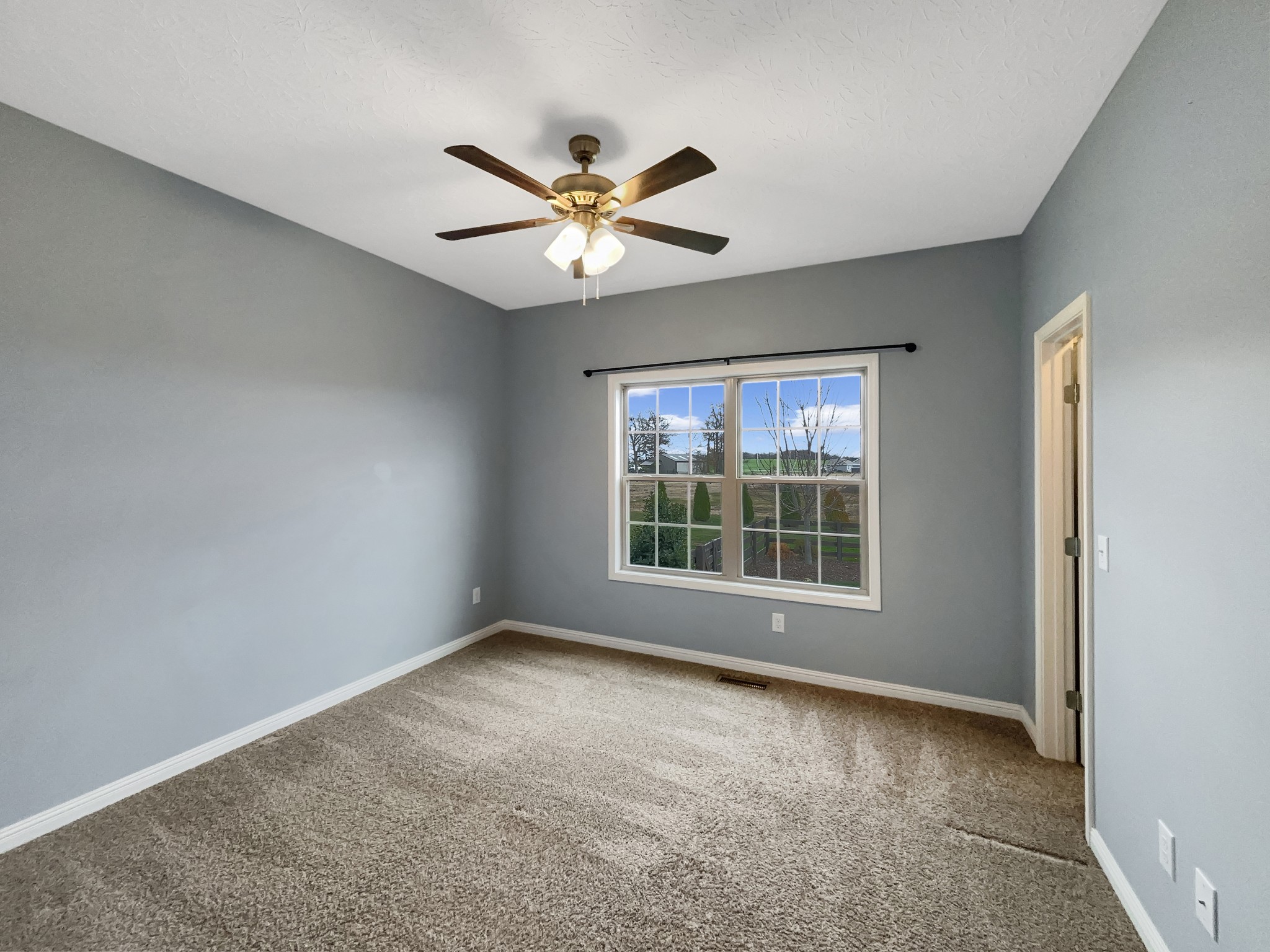 374 Cook Road Portland, TN 37148 - Photo 4 of 16 a view of an empty room with a window