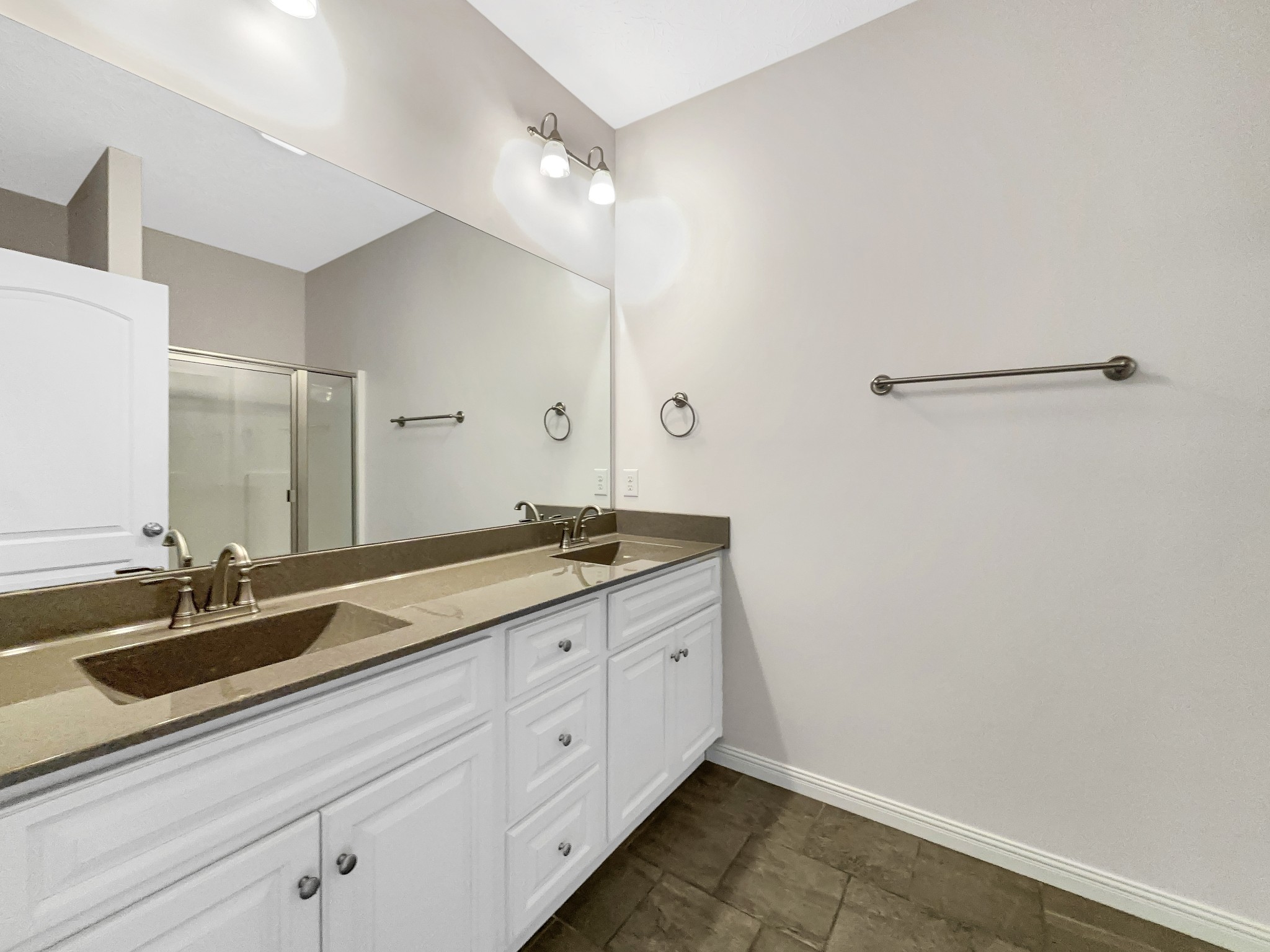 374 Cook Road Portland, TN 37148 - Photo 6 of 16 a bathroom with a double vanity sink and a mirror