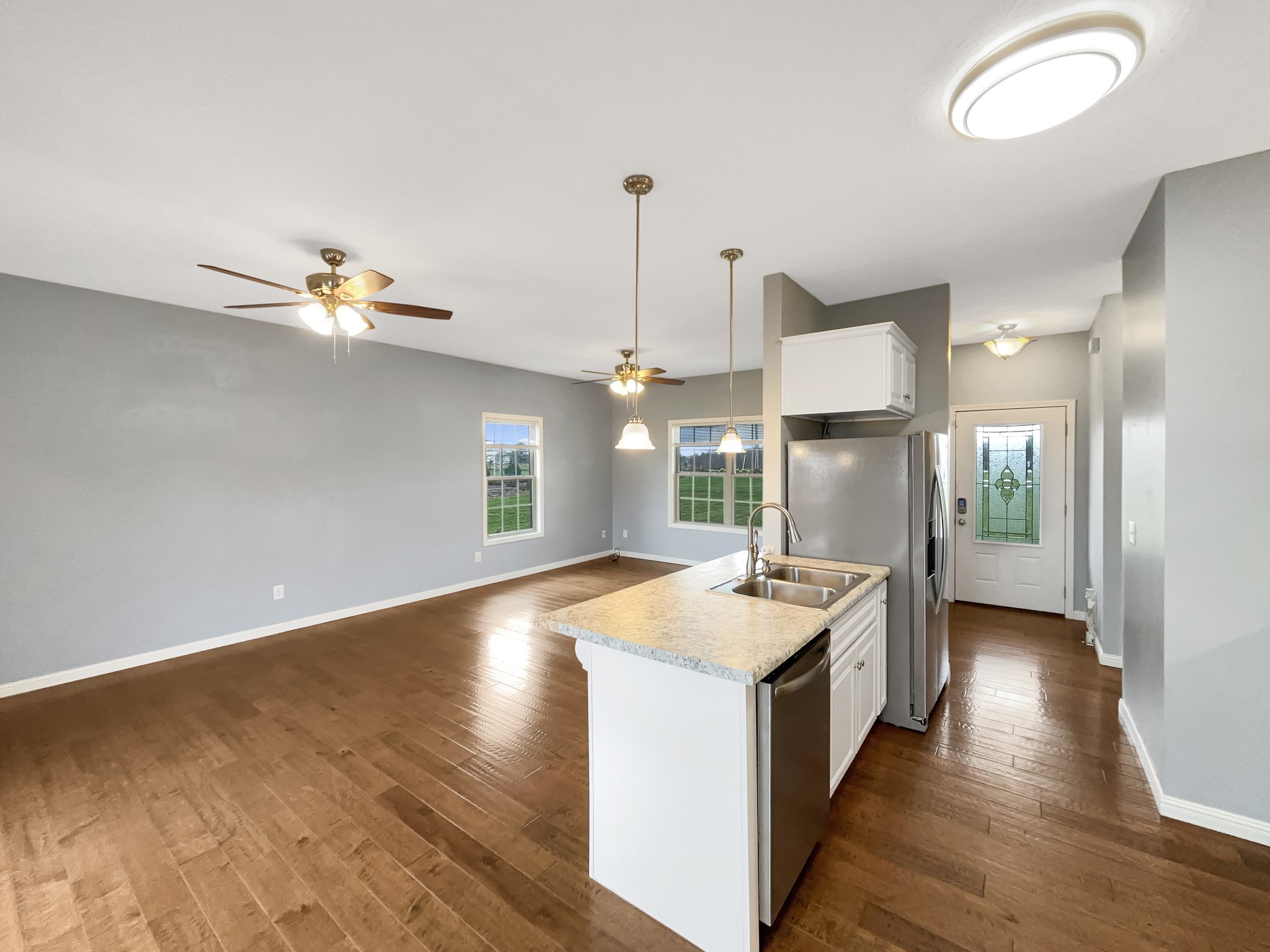 374 Cook Road Portland, TN 37148 - Photo 9 of 16 a open kitchen with a sink and dish washer