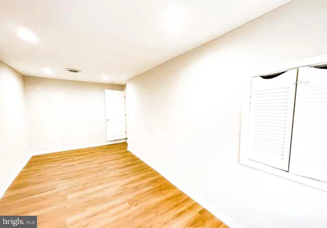 a view of a big room with wooden floor