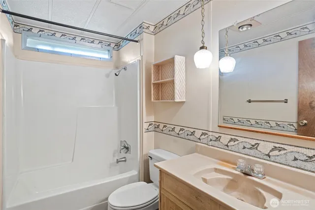 a view of a room with a wooden door