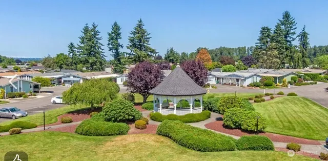 a view of a swimming pool with an outdoor seating